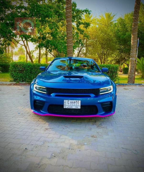 دۆج چارجەر
